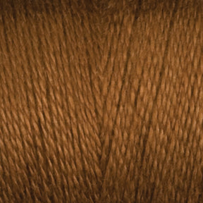 A close-up image of Maurice Brassard's 8/2 Bamboo Yarn | Tube, showcasing tightly woven fibers with a slightly shiny texture. The yarn appears thick, smooth, and evenly spun, suggesting it is suitable for various knitting or crocheting projects. Made from environmentally friendly materials and featuring antibacterial properties.