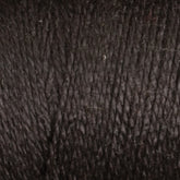 Close-up image of Maurice Brassard's 16/2 Bamboo Yarn in black. The texture is detailed, showcasing the individual strands tightly twisted together with slight variations in thickness, indicating a natural fiber composition. Made from sustainable Bamboo yarn, its matte appearance with subtle lighter flecks adds to its charm.