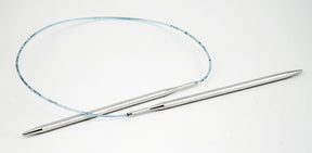 A pair of Skacel Addi Turbo Circular Knitting Needles, featuring metal circular tips and a thin, flexible plastic cord connecting the ends, placed on a plain white background. Perfect for effortlessly creating cuffs, collars, and doll clothes.