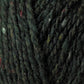 Close-up image of dark green Jo Sharp Silkroad DK Tweed yarn by Kingfisher Yarn & Fibre, featuring small flecks of red, white, and yellow. The texture of the yarn appears slightly coarse and thick, making it suitable for knitting or crocheting.