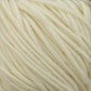 A close-up view of soft, cream-colored yarn strands tightly wound together. The yarn appears thick and plush, suggesting it may be used for knitting or crochet projects. Made from Plymouth Select Worsted Merino Superwash by Plymouth Yarn Co., the texture is smooth with a slightly fuzzy surface typical of superwash fibers, promising excellent stitch definition.