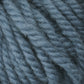 Close-up of thick, twisted Halcyon Yarn Classic Rug Wool | Skein in a soft blue-gray color, showcasing the texture and fibers in detail. The slightly fuzzy yarn strands are tightly wound, creating a pattern of interlocking twists, perfect for weavers seeking quality rug wool from Caledonian Dye Works.