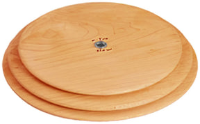 The Schacht Whorl by Schacht Spindle Co. is a wooden lazy Susan made up of two circular wooden discs in varying sizes. These discs are stacked on top of each other and connected with a central metal pivot, enabling the top disc to rotate smoothly. The wood is finished in a light natural hue, adding an elegant touch.