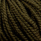 Close-up image of Norumbega yarn by Caledonian Dye Works, showcasing its tightly wound, thick, olive green Aran weight fibers and twisted strands, made from 100% U.S. wool.