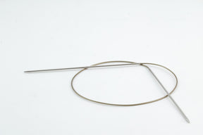 A pair of Addi Turbo Circular Knitting Needles by Skacel, featuring a flexible cable that connects the two straight needle tips, perfect for knitting cuffs, collars, or even doll clothes, placed against a white background.