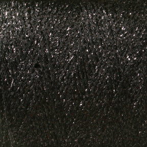 Close-up image of a spool of shimmering, dark-colored metallic yarn from the Astra Glow Metallic line by Huntingdon Yarn Mill, Inc. The thread has a slight sheen, giving it a sparkly appearance. The texture of the yarn is smooth and tightly wound in a diagonal pattern on this large cone.