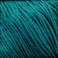 Close-up image of turquoise blue Cascade Ultra Pima Cotton Yarn by Cascade Yarns with tightly interwoven strands running diagonally across the frame. The texture and fibers of the Peruvian Pima Cotton are clearly visible, highlighting the rich color and detailed weave of the material.