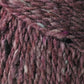 Close-up image of brown and purple heathered Jo Sharp Silkroad DK Tweed yarn by Kingfisher Yarn & Fibre, showcasing its soft, textured fibers and subtle color variations. The yarn appears thick and woolly, making it ideal for knitting or crocheting cozy garments or accessories.