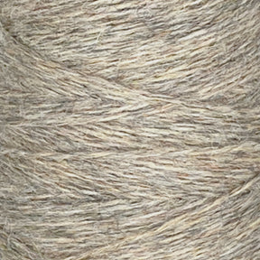 Close-up image of a spool of Jagger Brothers, Inc. JaggerSpun Heather 3/8 wool yarns in beige and light brown. The texture of the yarn is clearly visible, showing intertwined fibers and a consistent, tightly wound pattern. The surface appears slightly fuzzy, indicating a soft, natural material typical of heather yarns.