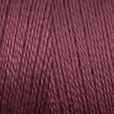 A close-up image of Maurice Brassard's 8/2 Bamboo Yarn in burgundy. The texture appears smooth, with uniformly twisted strands that create a consistent and rich hue. The photo emphasizes the yarn's details, showcasing its silky and slightly shiny appearance—ideal for environmentally conscious knitters.