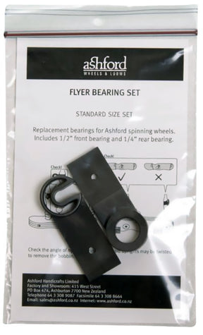 A clear plastic bag labeled "Ashford Flyer Bearing Set" from Ashford Handicrafts Limited contains replacement bearings for Ashford spinning wheels. The bag also features contact information and assembly instructions, with the bearings and components visible inside.