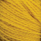 Close-up of bright yellow Harrisville Highland - Cones yarn from Harrisville Designs, twisted into a tight coil. The yarn has a soft, fuzzy texture and appears thick and warm, suitable for knitting or crocheting projects.