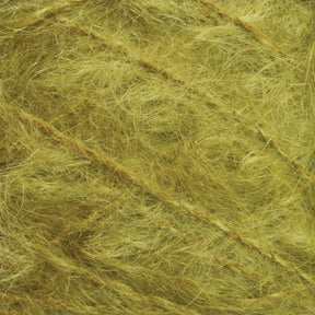 Close-up image of a Victorian Brushed Mohair Yarn | Large Skein by Caledonian Dye Works. The bundle showcases golden yellow, fibrous material with a coarse, tangled texture and strands of varying thickness intertwined in a chaotic pattern. The fibers catch the light, giving a slightly glossy appearance reminiscent of luxurious mohair.