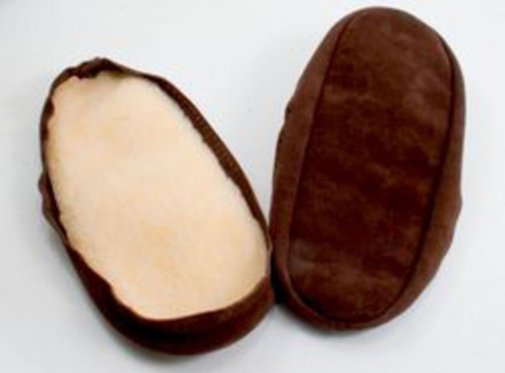 A pair of Bryson Distributing, Inc.'s suede leather and fleece soles is shown, one facing up and the other facing down. The bottom of the slippers appears to be cushioned with suede soles, while the inside lining is light-colored fleece, likely providing comfort and warmth.