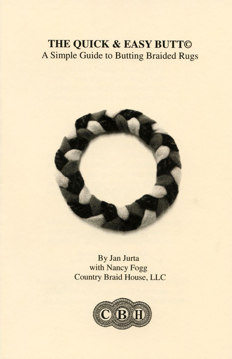 Cover page of the book titled "The Quick & Easy Butt©: A Simple Guide to Butting Braided Rugs" by Jan Jurta with Nancy Fogg, published by Country Braid House. An image of a braided rug circle, showcasing the butting process, is centered on the page with the Country Braid House logo at the bottom.