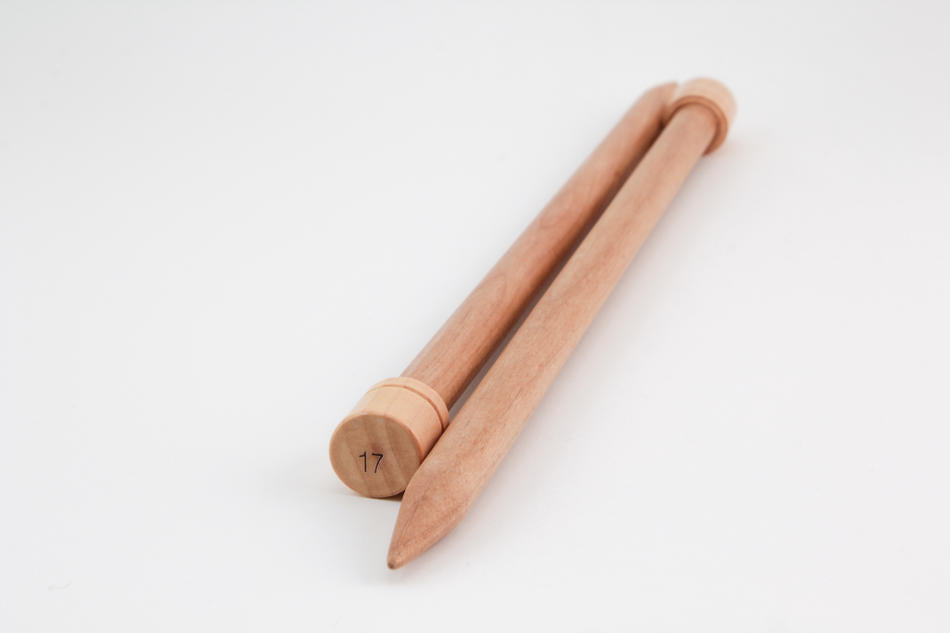 Two 12" Bamboo Single-Point Knitting Needles from Accessories Unlimited lie parallel on a white background. One needle is marked with the number 17 at the end, indicating its size. The needles feature a light, natural wood finish and have a smooth texture.