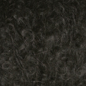 Close-up view of dark, tightly coiled curly hair. The image focuses on the texture and pattern of the curls, reminiscent of a Victorian Bouclé Mohair Yarn from Caledonian Dye Works' Signature Victorian Collection.