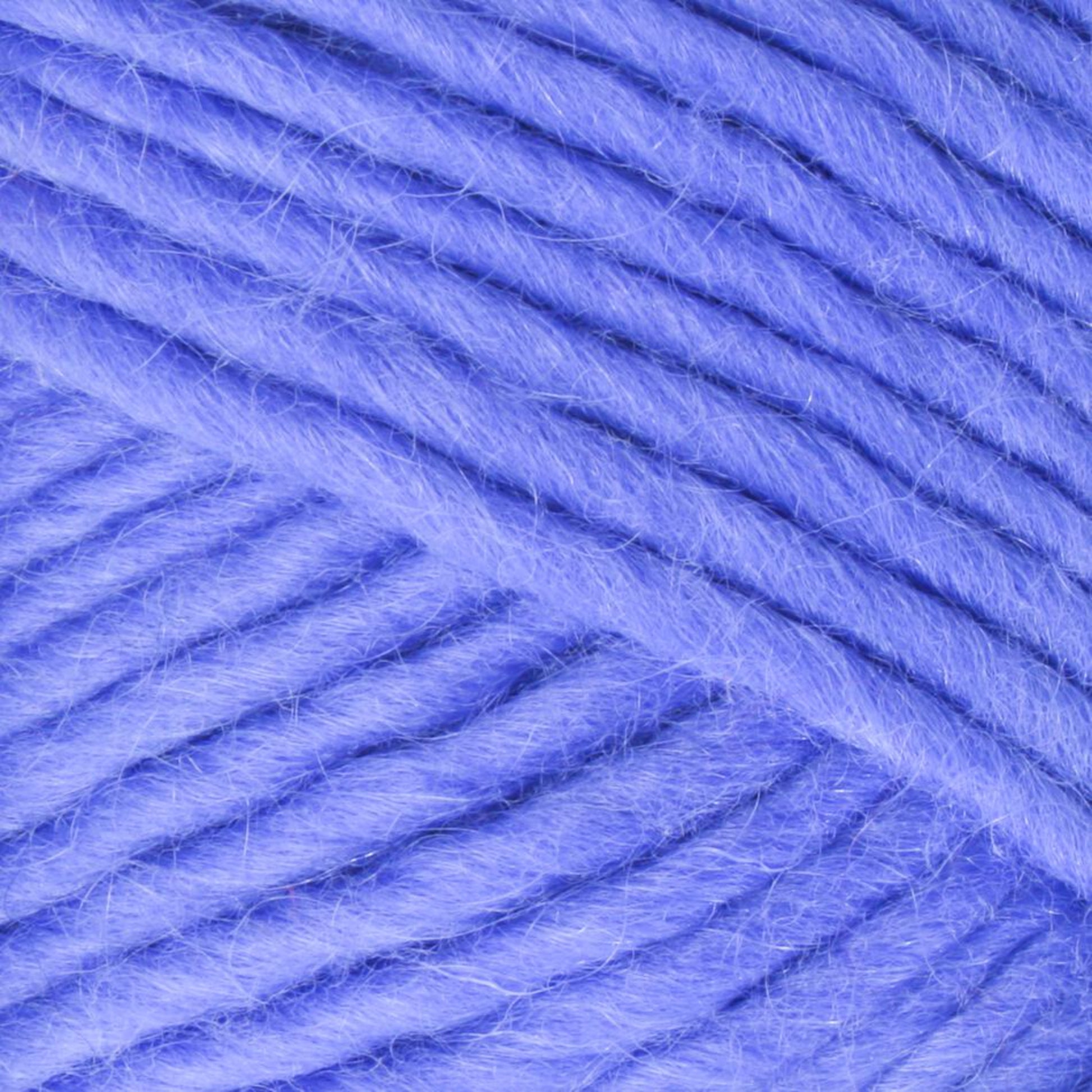 Close-up image of the thick, soft Lamb's Pride Bulky Yarn by Brown Sheep in a rich purple hue. The fibers of the yarn are slightly fuzzy, and the strands are tightly twisted together, making it perfect for knitters and crocheters.