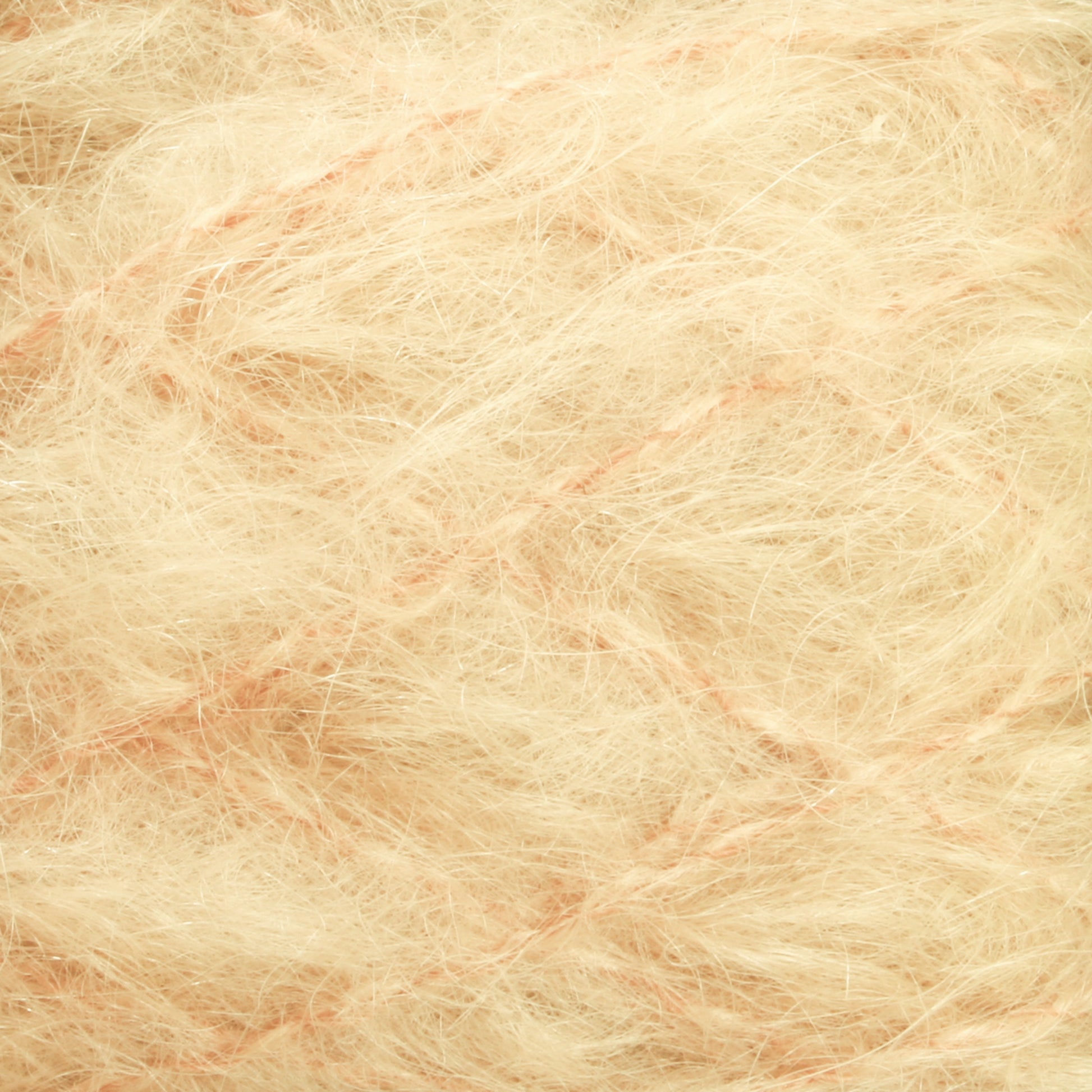 Close-up image of a textured surface composed of intertwined, fuzzy fibers in light beige and cream tones. The dense and soft strands create a luxurious Victorian Brushed Mohair Yarn-like appearance from Caledonian Dye Works, with some delicate pinkish lines visible among the fibers, reminiscent of their large skein offerings.