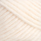 Close-up of Lamb's Pride Worsted Yarn by Brown Sheep, showcasing its cream-colored, chunky wool with a soft, fuzzy texture and thick strands coiled together. Ideal for felting projects or Navajo-style weaving, the yarn is tightly wound with each strand clearly visible, highlighting the natural fibers and slight variations in thickness.