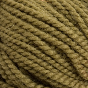 Close-up image of green or olive-colored, thick, twisted yarn fibers tightly wound into a chunky skein. The Norumbega yarn by Caledonian Dye Works, made from 100% U.S. wool, showcases detailed strands with slight fuzziness, promising a durable fabric for your next cozy project.