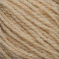 Close-up image of a skein of Harrisville Shetland Yarn - Unwashed Cones by Harrisville Designs, highlighting its twisted and soft texture. The fibers are tightly wound, presenting a uniform pattern in a neutral, light tan color—ideal for Fair Isle knitting designs or lightweight blankets.