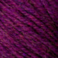 Close-up image of purple Bartlettyarns' Bartletts Maine Wool - Sport yarn with a mix of different shades. The texture appears soft and fibrous, showcasing the intertwined strands. Hints of pink and blue fibers are also visible, adding depth to the color.