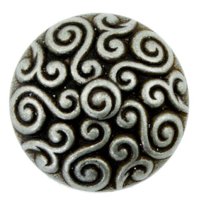 The Metal Antique Dome Button by Dill Buttons of America, Inc. showcases a round, metallic finish with an intricate swirl design featuring raised spirals and swirls. This antiqued dome button has a textured, antique appearance that adds a touch of vintage elegance.