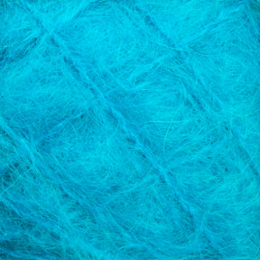 Close-up image of the Victorian Brushed Mohair Yarn | Mini Skein by Caledonian Dye Works, showcasing its vibrant blue fluffy texture. The soft mohair fibers are interwoven in a chaotic pattern, appearing delicate and airy to create a fuzzy and cozy visual effect.