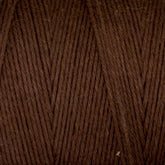 Close-up of Maurice Brassard's Medium Cotton 16/8 Mop Yarn. The strands are tightly wound, and the texture is detailed, highlighting individual fibers and the twist of the thread. Perfect for knitting or weaving, its rich, deep brown color exudes warmth and quality.