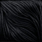 Close-up of a skein of Cascade Ultra Pima Cotton Yarn by Cascade Yarns. The black yarn is made from Peruvian Pima Cotton fibers that are tightly twisted, giving them a smooth and slightly shiny appearance. Known for its soft hand, the Cascade Ultra Pima Cotton Yarn ensures strands are uniform in thickness and neatly arranged, creating a textured pattern.