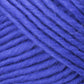 Close-up image of thick, soft, royal blue Lamb's Pride Bulky Yarn from Brown Sheep, showing detailed texture and individual fibers. The yarn is tightly wound in a spiral pattern, revealing its fluffy and slightly fuzzy nature—perfect for knitters and crocheters crafting Icelandic sweaters.