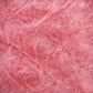 Close-up of the Victorian Brushed Mohair Yarn | Mini Skein by Caledonian Dye Works. The textured, pink fluffy fibers are intertwined, creating a soft and fuzzy appearance reminiscent of delicate Victorian yarns. The overall effect is light and fibrous, evoking the charm of natural fiber textiles.