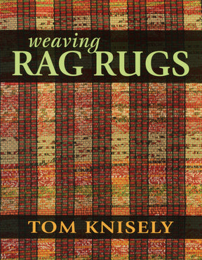 The cover of the book *Weaving Rag Rugs* from National Book Network showcases a vibrant, woven textile background adorned with horizontal and vertical stripes in earthy tones. The title is prominently displayed in light green and yellow text, offering valuable design advice, while the author's name, Tom Knisely, appears boldly at the bottom in gold letters.