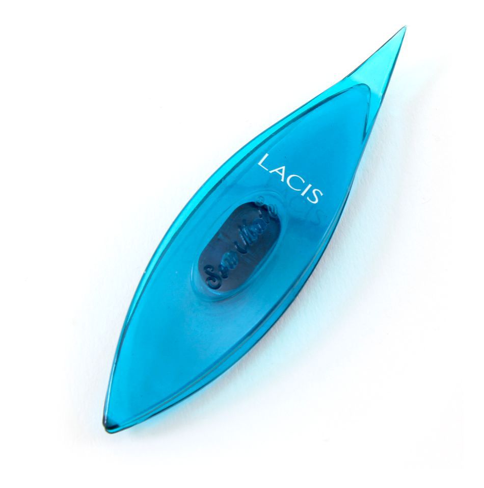 A blue, boat-shaped Sew Mate Tatting Shuttle, 3" long, with the word "Sew Mate" printed on it.