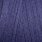 Close-up image of Maurice Brassard's 8/2 Bamboo Yarn | Mini-cone in blue, showcasing the texture and tightly wound strands. The color is a rich, medium-toned blue, and the fibers appear soft and consistent, ideal for knitters who value environmentally friendly materials in their knitting or crocheting projects.