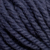 Close-up of deep blue Halcyon Yarn Classic Rug Wool | Strand by Caledonian Dye Works, tightly intertwined, displaying the texture and fiber details. The Classic Rug Wool appears soft, with slight fuzziness visible on the individual strands. The image showcases the intricate structure of the thick, twisted fibers adored by rug weavers.