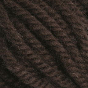 Close-up image of tightly twisted strands of Halcyon Yarn Classic Rug Wool by Caledonian Dye Works, showcasing a textured and fibrous surface. The hand-dyed yarn appears thick and plush, with slight variations in color and thickness.