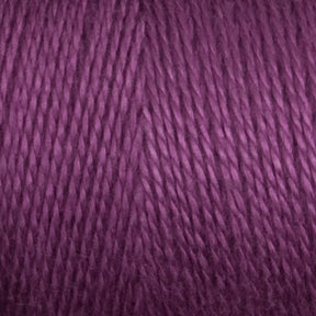 Close-up image of Maurice Brassard 8/2 Tencel Yarn | Mini Cone in violet purple, showcasing tightly twisted strands and a smooth, soft texture that's perfect for knitting accessories or weaving projects.