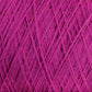 Close-up image of tightly wound JaggerSpun Maine Line 3/8 Yarn | Mini-cone from Jagger Brothers, Inc., in magenta, showcasing intricate, overlapping fibers that create a textured and detailed pattern.