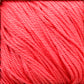 Close-up of a bundle of vibrant coral-colored yarn. The strands are neatly wound together, showcasing the soft hand and textured appearance of Cascade Yarns' Ultra Pima Cotton Yarn.