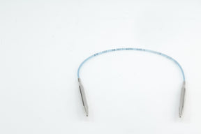 A pair of Addi Turbo Circular Knitting Needles by Skacel, featuring blue tubing and metallic ends designed with precision reminiscent of short circular needles, is shown against a white background.