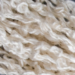 Close-up image of Stardust Silk Yarn by Henry's Attic showcases its soft, chunky texture. The white yarn has a textured, twisted appearance with fluffy and loosely twisted fibers, giving it a cozy and plush look ideal for knitters.