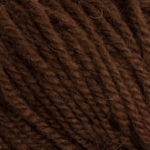 Close-up view of the Halcyon Deco Rug Wool by Caledonian Dye Works, showcasing its soft texture and tightly twisted strands. The fibers, made from 100% wool, exhibit slight variations in color and thickness, creating a cozy and inviting look. This versatile yarn would be perfect for any deco rug or knitting project.