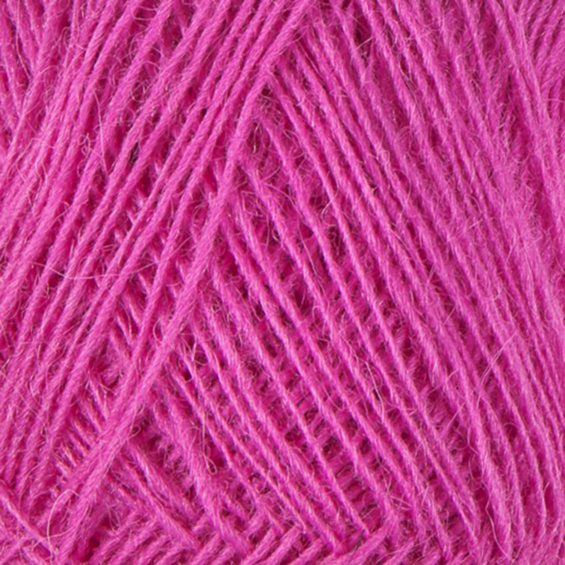 Close-up image of Einband Lopi yarn by Berroco, Inc., showing intricate intertwining and texture of the fibers. The yarn appears soft and slightly fuzzy, with individual strands clearly visible in a crisscross pattern, reminiscent of delicate lace knitting.