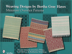 The cover of "Weaving Designs Miniature Overshot Patterns" features five woven fabric samples in various patterns and colors set against a teal background, ideal for use with four-harness looms. The book, published by Schiffer Publishing Co., is authored by Norma Smayda, Gretchen White, Jody Brown, and Katharine Schelleng.