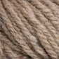 Close-up image of Halcyon Yarn Classic Rug Wool | Skein by Caledonian Dye Works. The yarn is a natural, undyed beige color with a soft, slightly fuzzy texture. The fibers are thick and twisted together, showing a detailed view of the strands and their intertwined structure—perfect for weavers seeking high-quality rug wool.