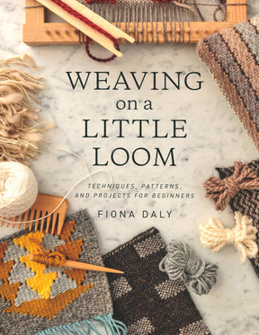 The cover of "Weaving on a Little Loom" by Ingram Content author Fiona Daly features an array of woven pieces, diverse yarns, and a small loom displayed on a marble surface. This book emphasizes beginner techniques, patterns, and projects using eco-friendly materials and includes textured designs along with step-by-step tutorials.