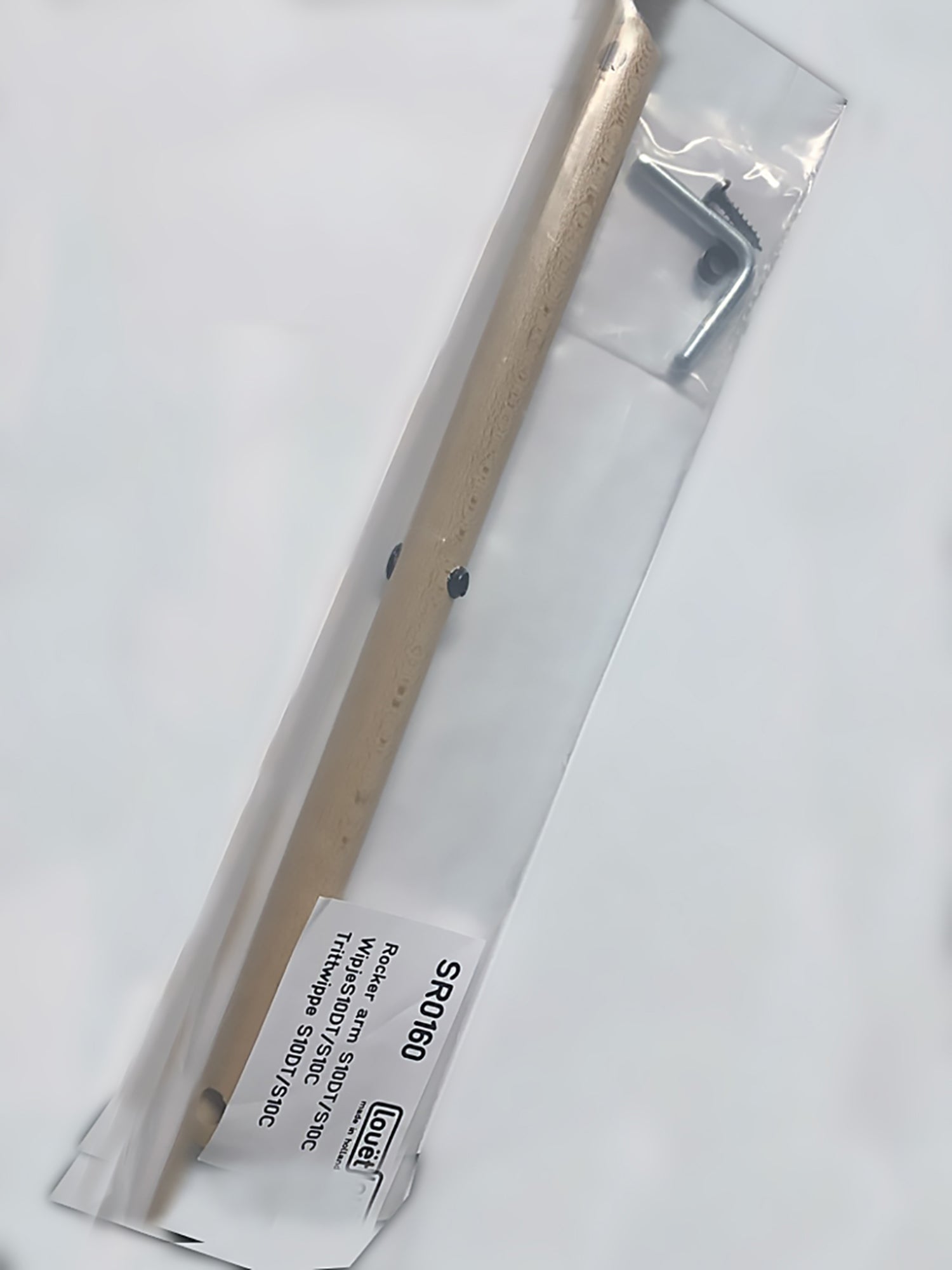 A tan wooden Louët Rocker Arm, Victoria, packaged in a transparent plastic container with a black thumb rest and additional components is visible. The lower corner of the package features a white label marked "SRG66" along with some additional descriptive text. The sleek design mirrors the craftsmanship associated with Louët Inc.'s products, including their renowned Victoria spinning wheels.