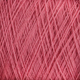 Close-up image of JaggerSpun Maine Line 3/8 Yarn in pink intricately woven together. The image focuses on the detailed texture and complexity of the crisscrossing strands, showcasing their soft medium grade wool nature from Jagger Brothers, Inc.